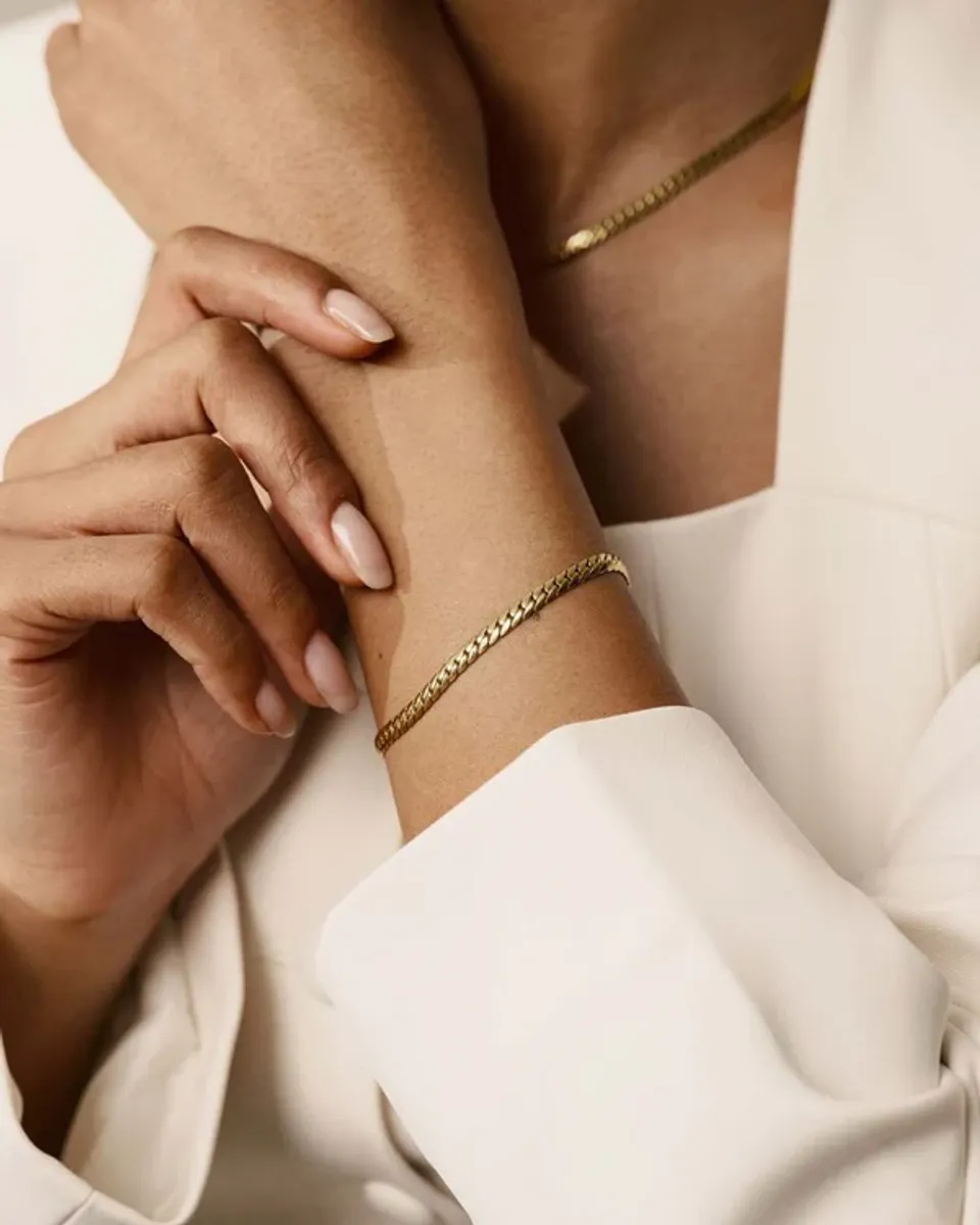 Mockberg 'Serpentine' gullfarget armbånd i stål- Medium